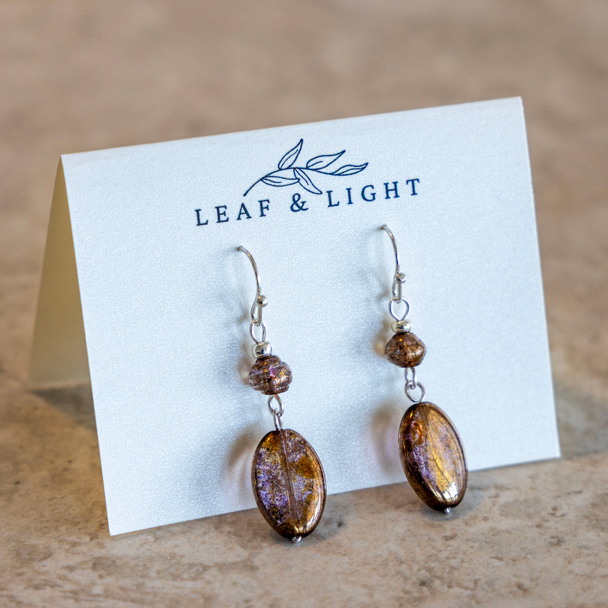 LUMINOUS BROWN OVAL DANGLE EARRINGS | SILVER PLATED