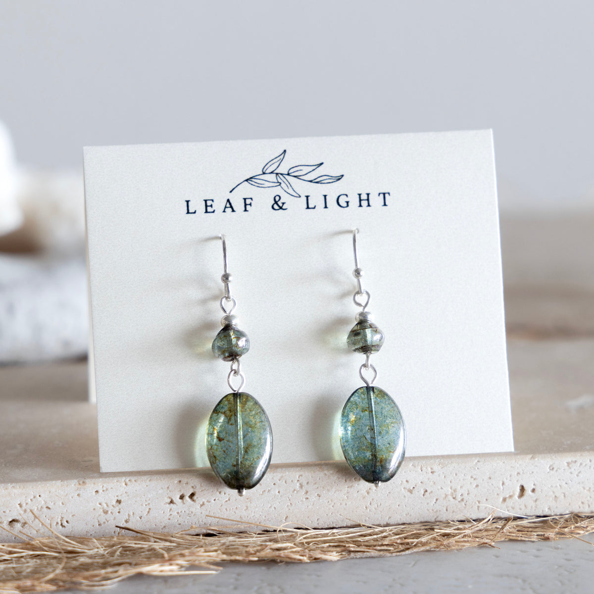 LUSTROUS GREEN OVAL DANGLE EARRINGS | SILVER PLATED
