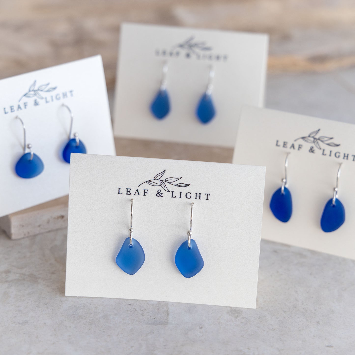 BLUE COASTAL GLASS DROP EARRINGS | SILVER PLATED
