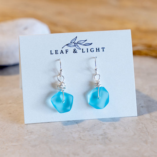 LIGHT TURQUOISE WIRE WRAPPED GLASS EARRINGS | SILVER PLATED