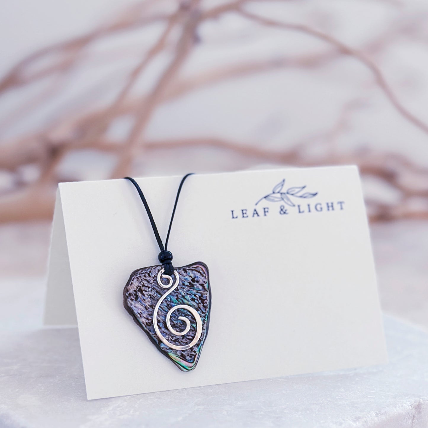 PĀUA AND STERLING NECKLACES