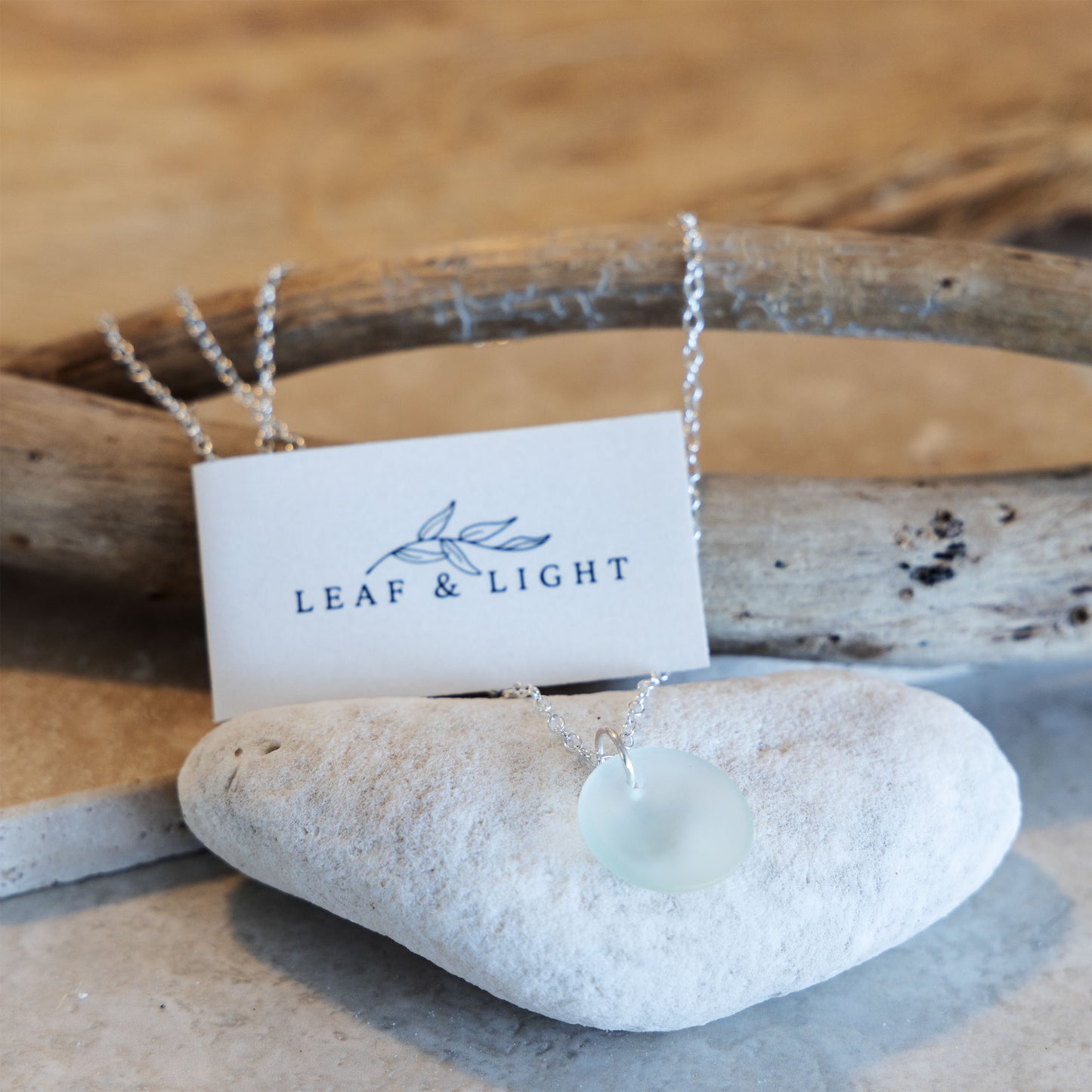 SILVER PLATED COASTAL GLASS NECKLACE - LIGHT AQUA CIRCLE