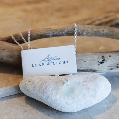 SILVER PLATED COASTAL GLASS NECKLACE - LIGHT AQUA CIRCLE