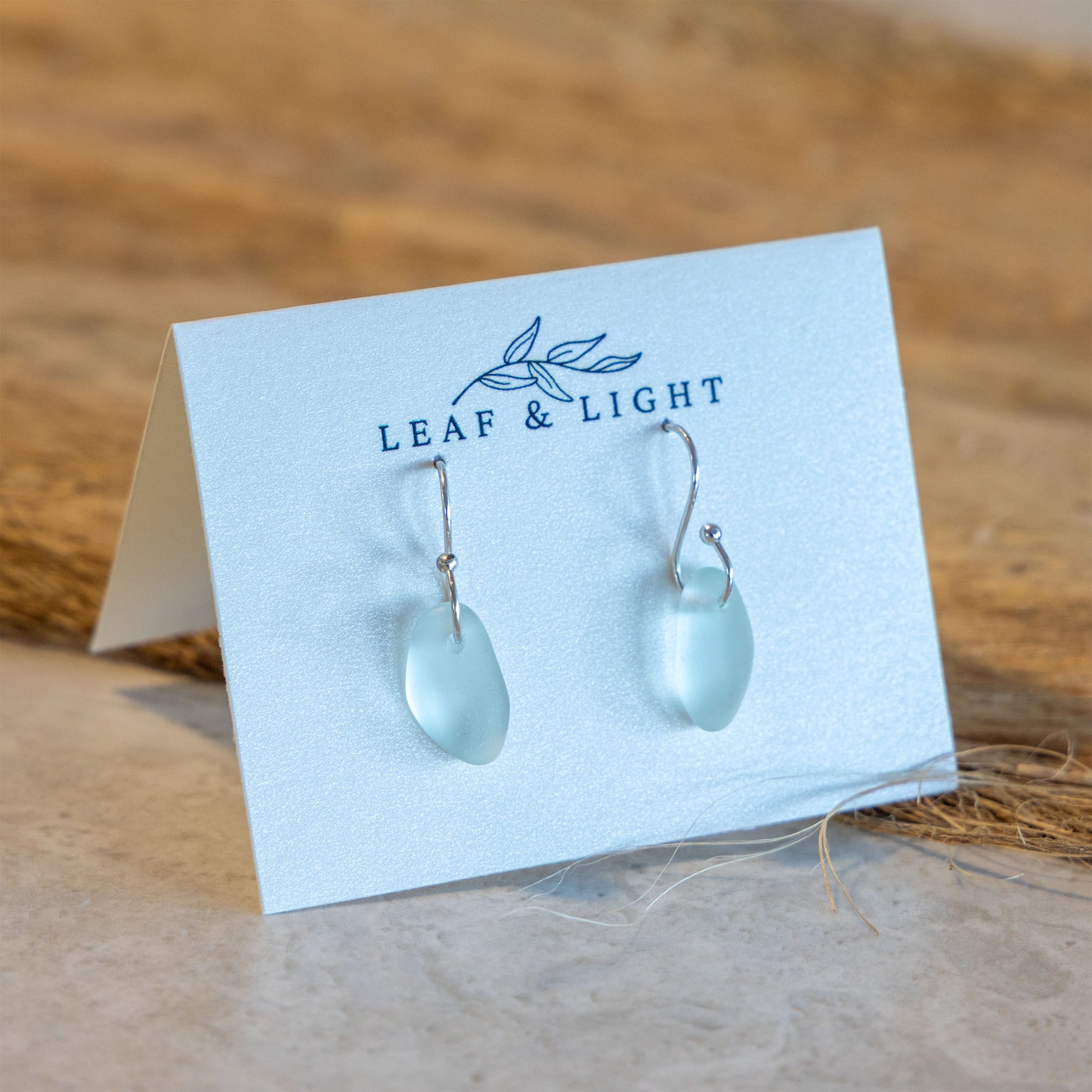 LIGHT AQUA PETAL COASTAL GLASS EARRINGS | SILVER PLATED