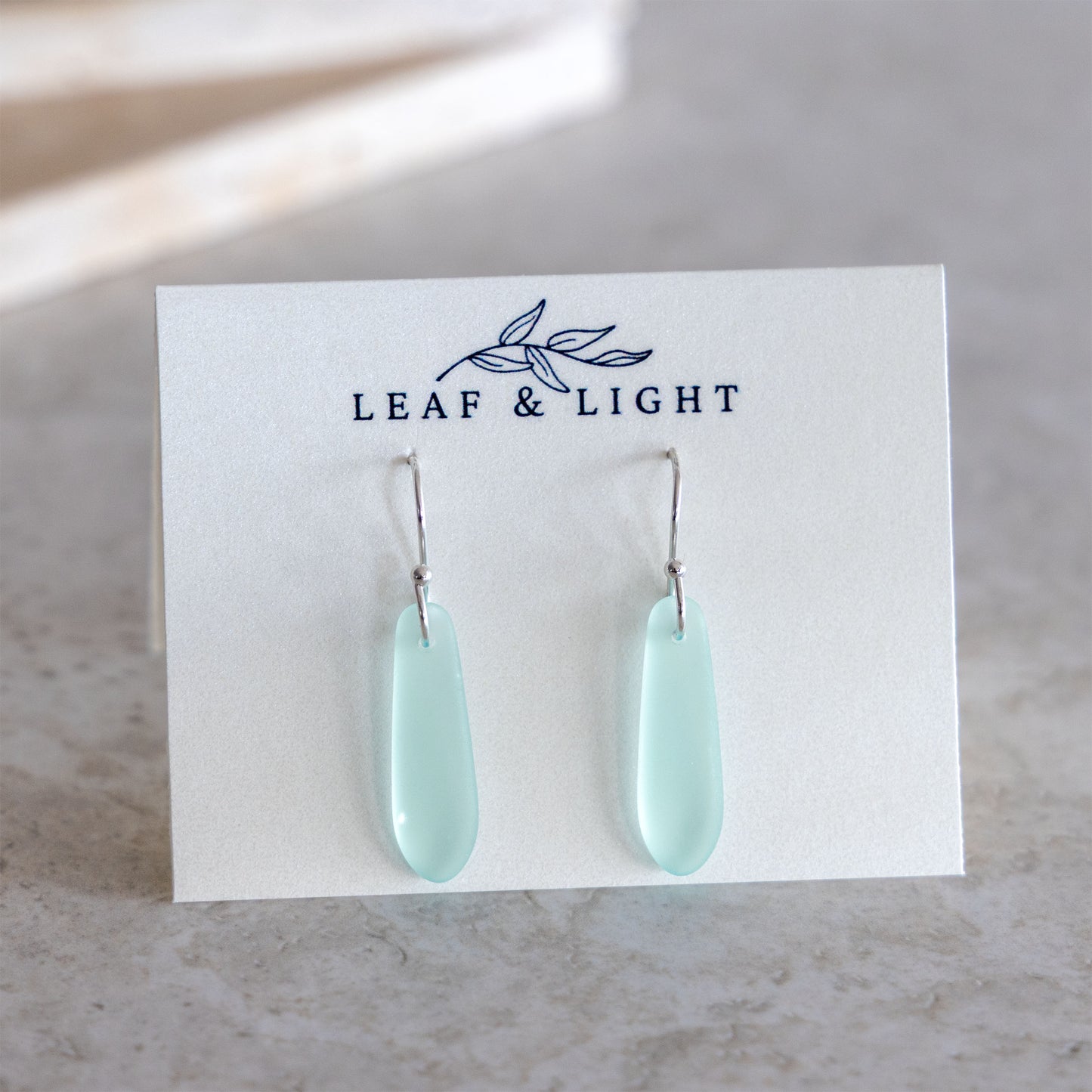 COASTAL GLASS SILVER PLATED EARRINGS - LIGHT AQUA TEARDROP