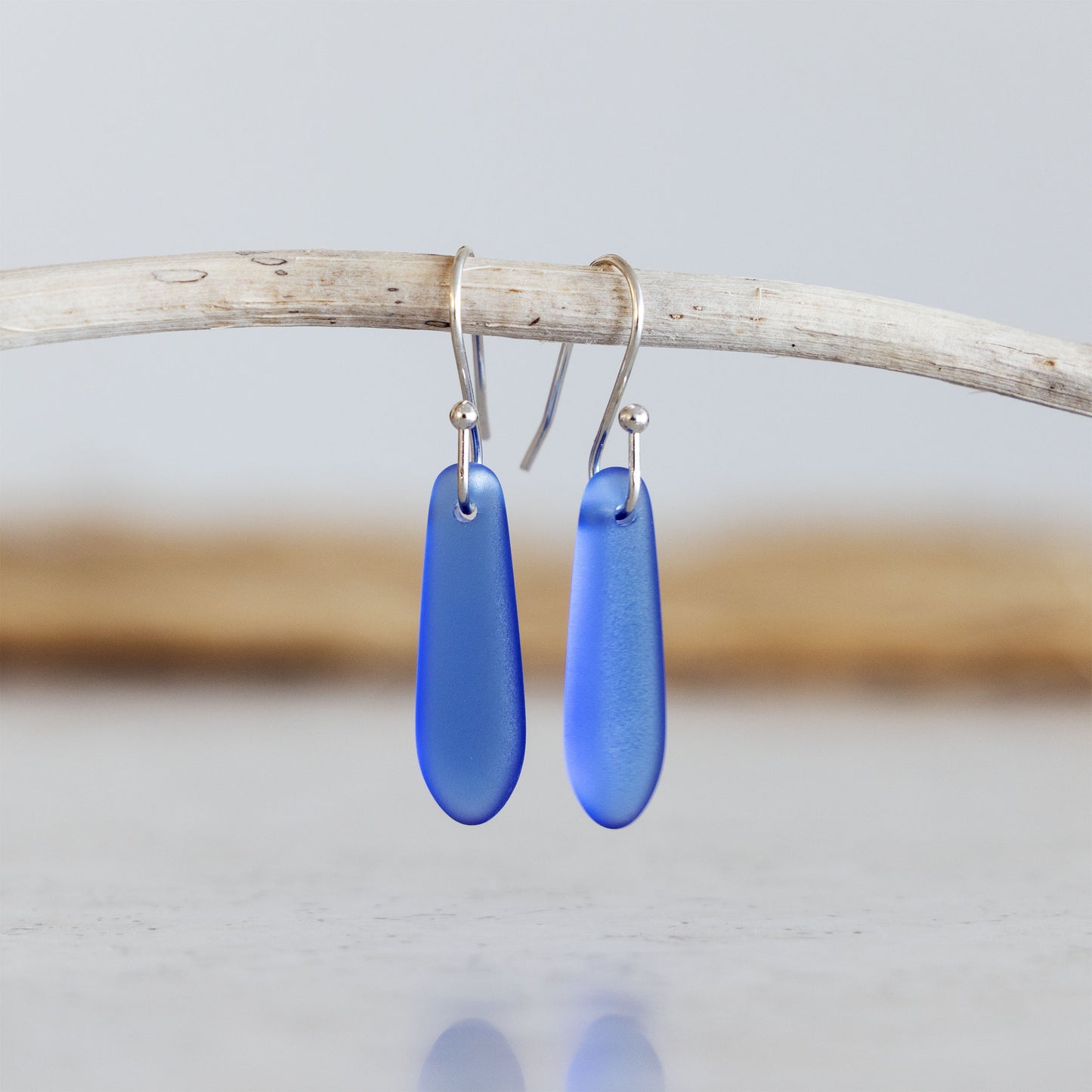 SKY BLUE TEARDROP COASTAL GLASS EARRINGS | SILVER PLATED