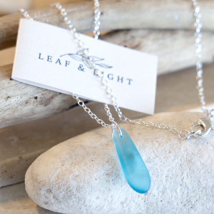 LIGHT TURQUOISE TEARDROP COASTAL GLASS NECKLACE | SILVER PLATED