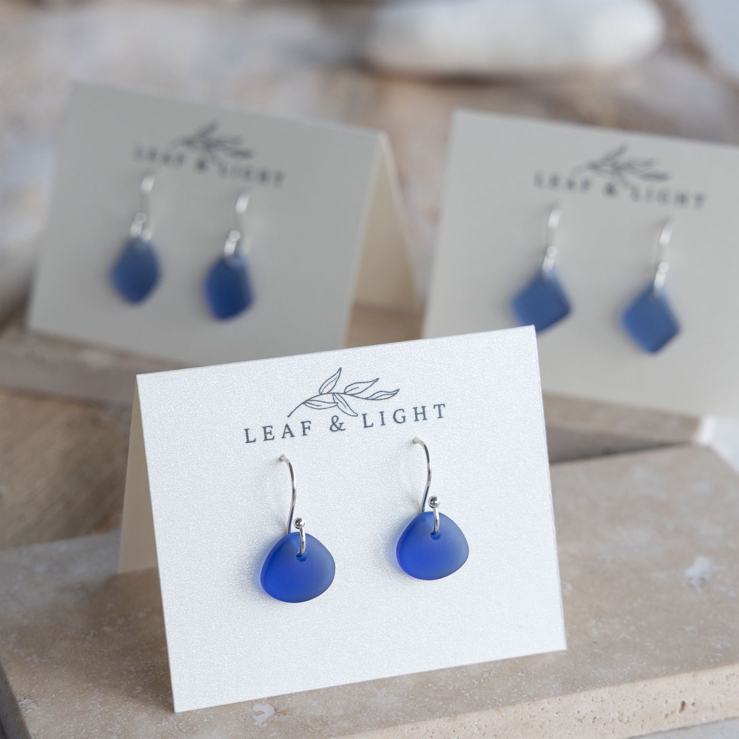 BLUE COASTAL GLASS DROP EARRINGS | SILVER PLATED