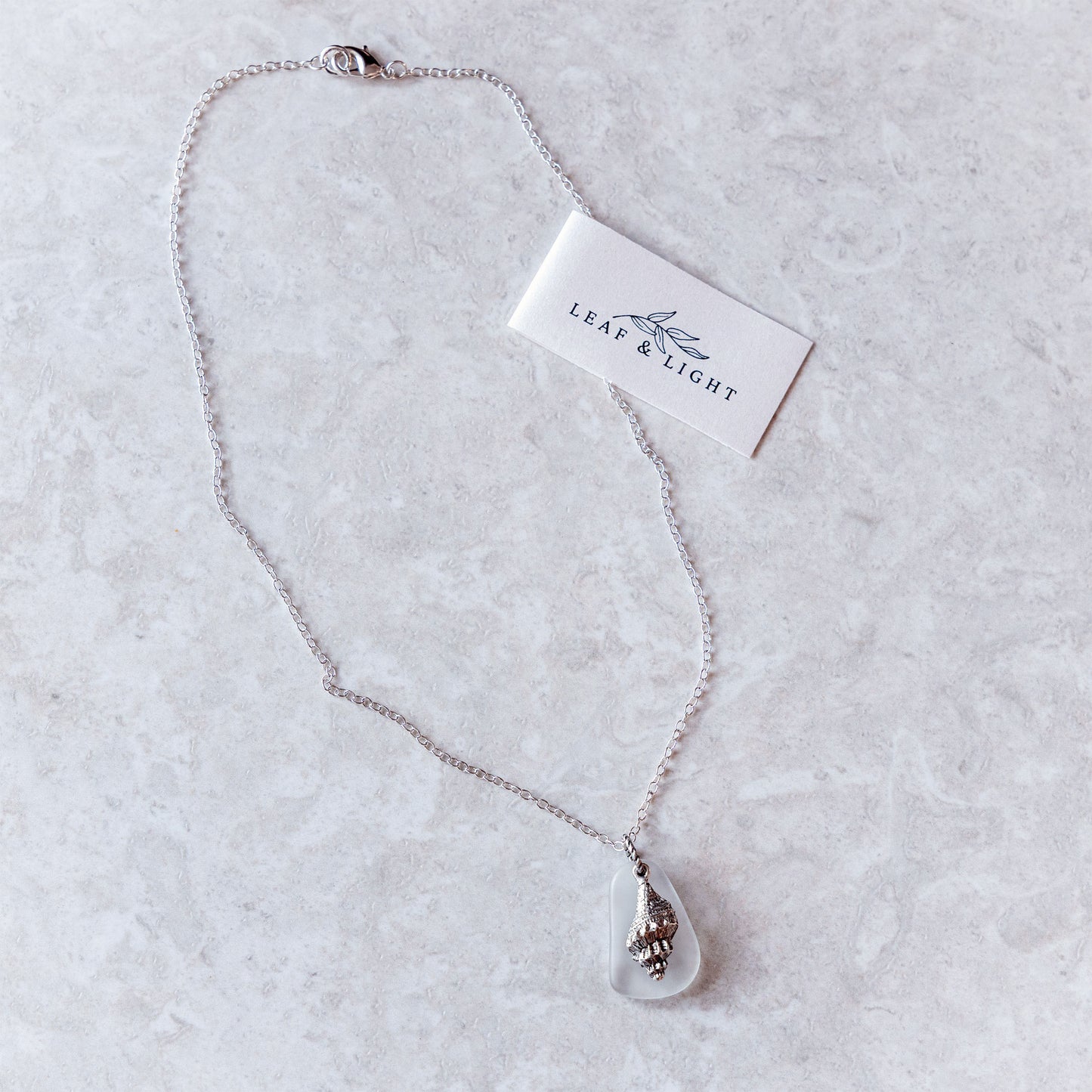 TRUMPET SHELL AND GLASS CHARM NECKLACE | SILVER PLATED