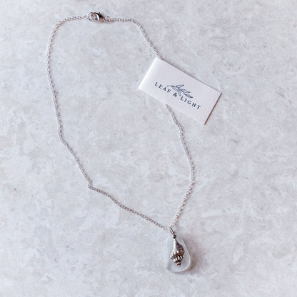 TRUMPET SHELL AND GLASS CHARM NECKLACE | SILVER PLATED