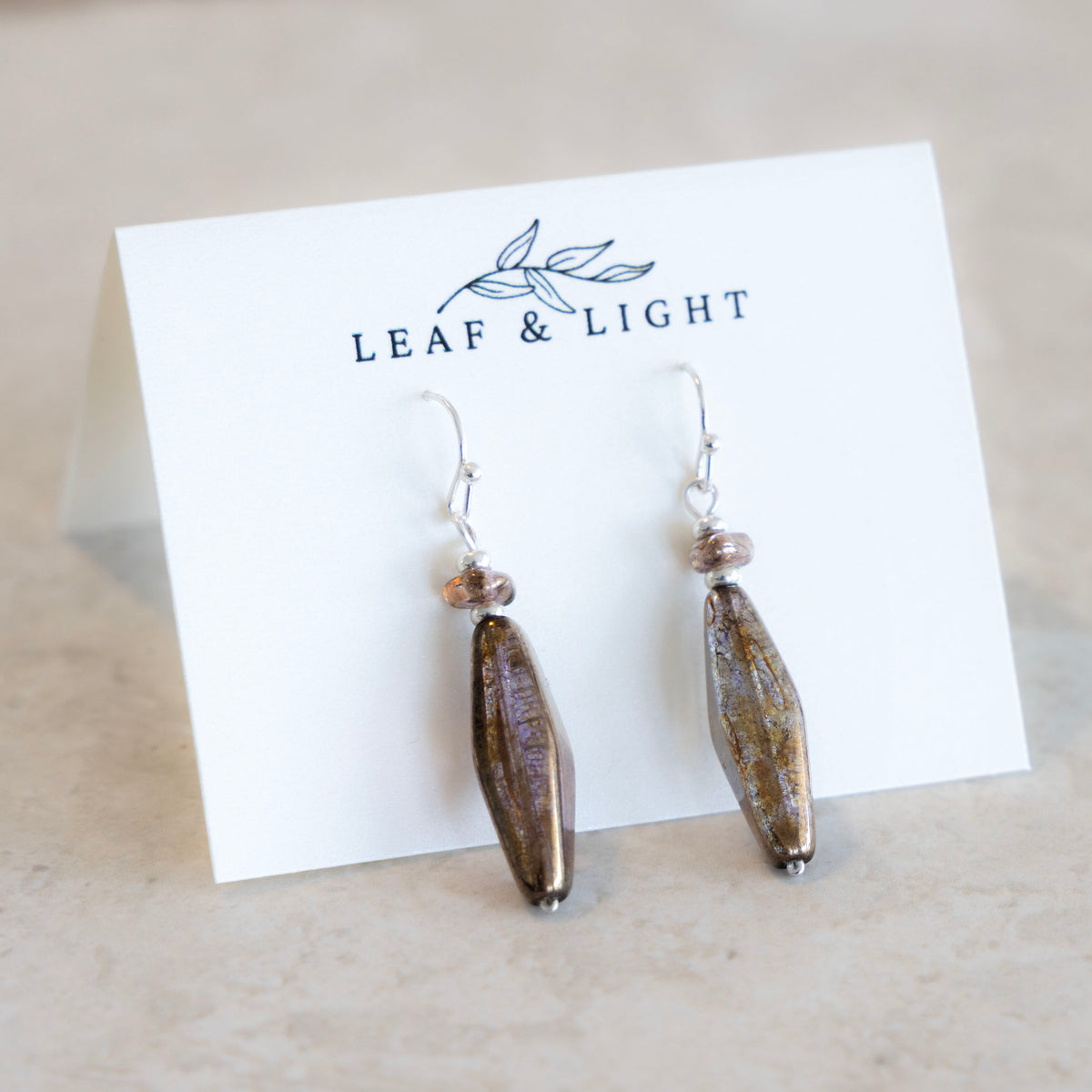 LUMINOUS BROWN SLENDER LONG FACETED EARRINGS | SILVER PLATED